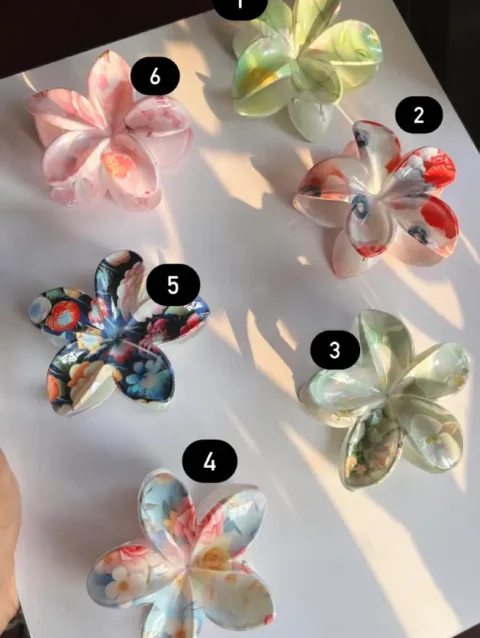 Flower hair clip, hair accessory, floral hair clip, hair jewelry, hair clutch, stylish hairpin, bridal hair accessory, summer hair clip, trendy hair accessory, gift for her, Elegant hair clip, fashion accessory, decorative hairpin, hair ornament, unique hair clip, vintage hair accessory, handmade hair jewelry, chic hair clip, party hair accessory, everyday hair clip, special occasion hair jewelry, colorful hair clip.