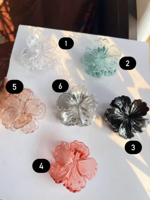 Flower hair clip, hair accessory, floral hair clip, hair jewelry, hair clutch, stylish hairpin, bridal hair accessory, summer hair clip, trendy hair accessory, gift for her, Elegant hair clip, fashion accessory, decorative hairpin, hair ornament, unique hair clip, vintage hair accessory, handmade hair jewelry, chic hair clip, party hair accessory, everyday hair clip, special occasion hair jewelry, colorful hair clip.